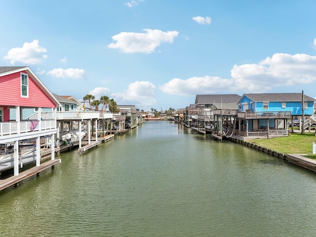 22123 Yoakum Dr, Galveston, TX 77554 - dock area featuring a water view and boat lift