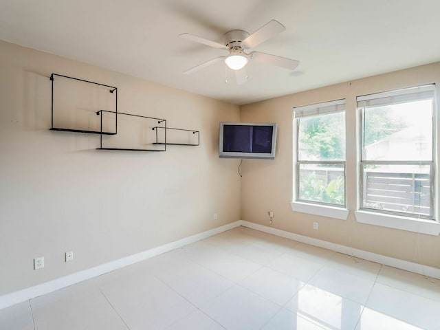 3419 Gillespie St, Houston, TX 77020 - unfurnished room with a ceiling fan and tile patterned floors