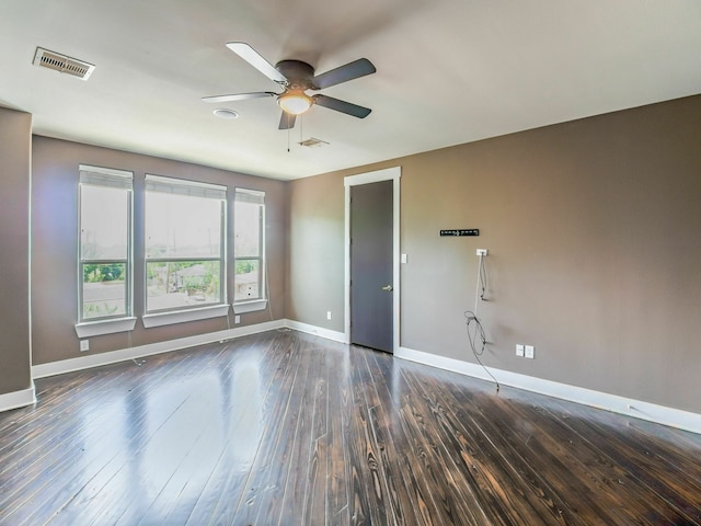 3419 Gillespie St, Houston, TX 77020 - unfurnished room with a ceiling fan and dark wood-style flooring