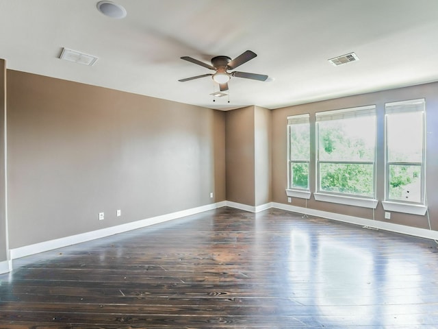 3419 Gillespie St, Houston, TX 77020 - spare room with dark wood-type flooring and ceiling fan
