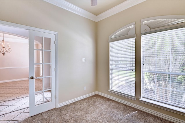 30 N Scribewood Cir, The Woodlands, TX 77382 - carpeted spare room featuring ornamental molding and a chandelier