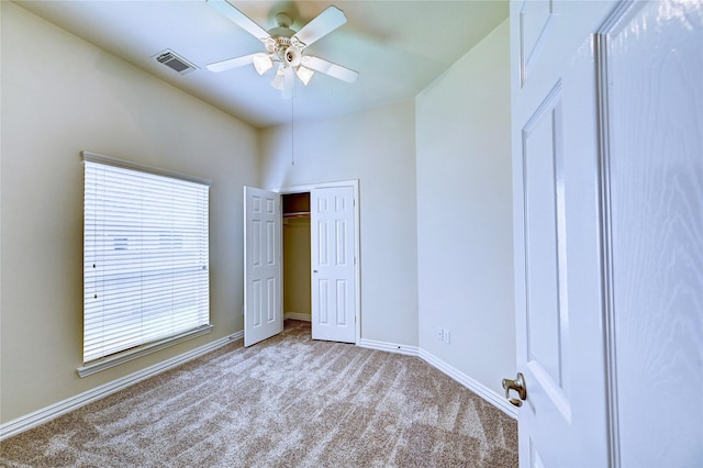 30 N Scribewood Cir, The Woodlands, TX 77382 - unfurnished bedroom with carpet floors, a closet, and a ceiling fan