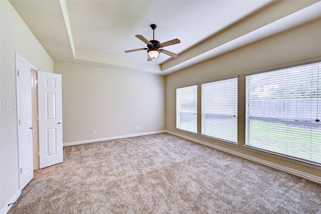 30 N Scribewood Cir, The Woodlands, TX 77382 - empty room with carpet flooring, a tray ceiling, and ceiling fan