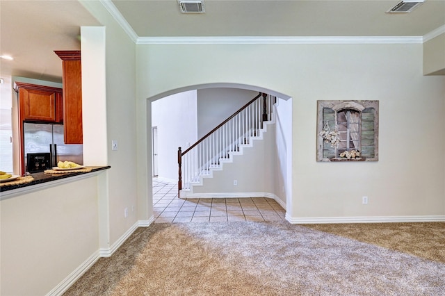 30 N Scribewood Cir, The Woodlands, TX 77382 - unfurnished living room featuring arched walkways, light carpet, ornamental molding, stairs, and light tile patterned floors