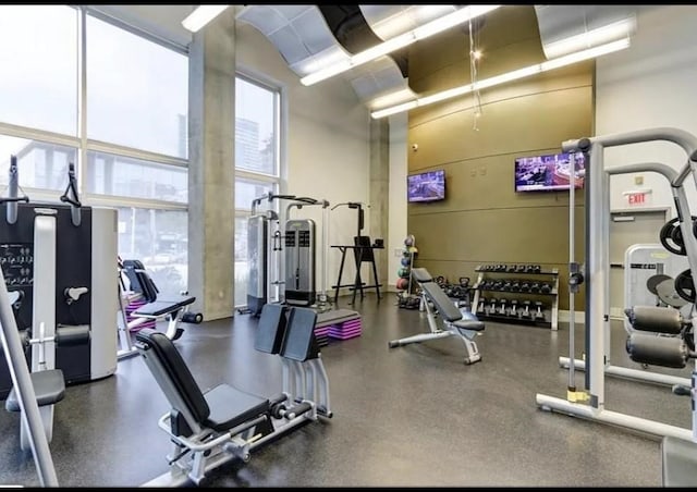 1901 Post Oak Blvd Unit 3101, Houston, TX 77056 - gym with a towering ceiling