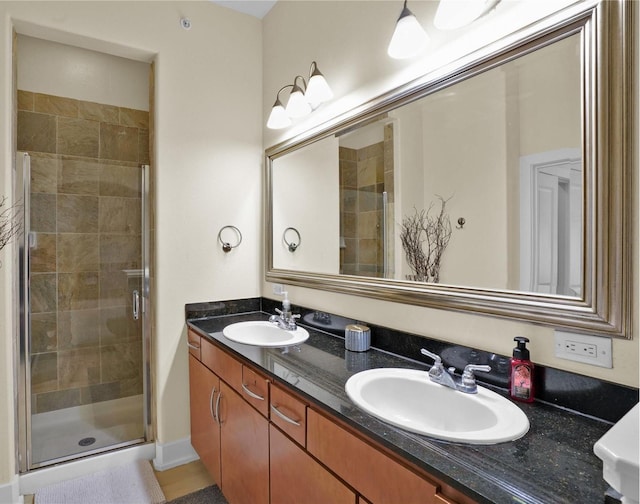 1901 Post Oak Blvd Unit 3101, Houston, TX 77056 - full bathroom featuring double vanity and a stall shower