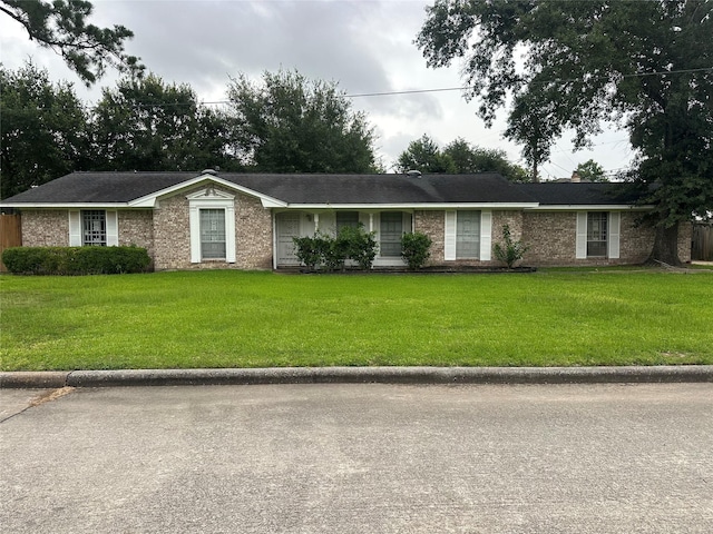 6646 Bayou View Dr, Houston, TX 77091 - single story home with a front lawn and brick siding