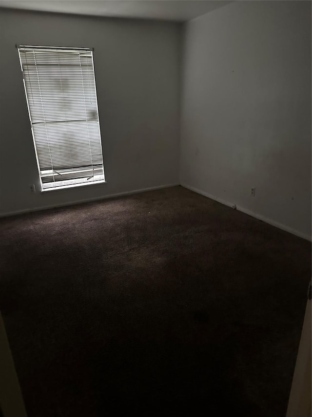 6646 Bayou View Dr, Houston, TX 77091 - carpeted empty room with baseboards