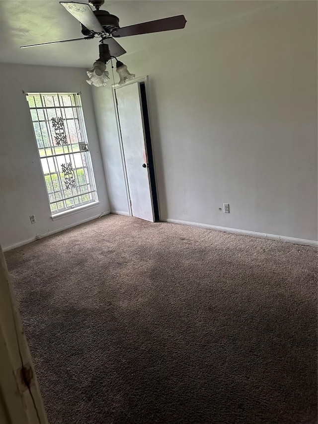 6646 Bayou View Dr, Houston, TX 77091 - carpeted spare room featuring ceiling fan and baseboards