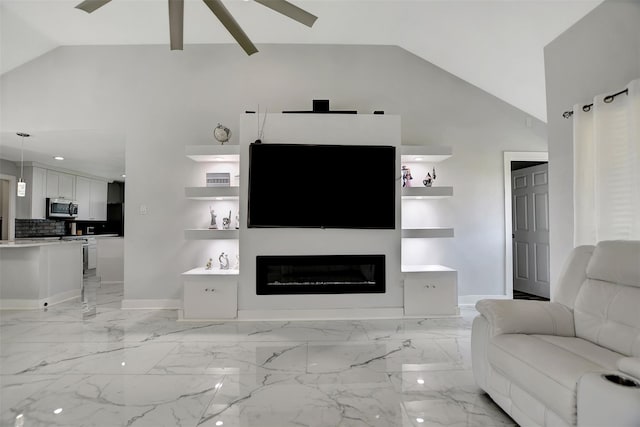 16806 Carbridge Dr, Houston, TX 77084 - living area with a ceiling fan, light marble finish flooring, a glass covered fireplace, and high vaulted ceiling