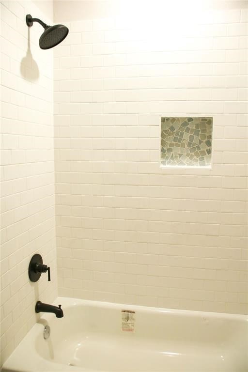 13214 Buccaneer Pkwy, Freeport, TX 77541 - bathroom featuring bathing tub / shower combination