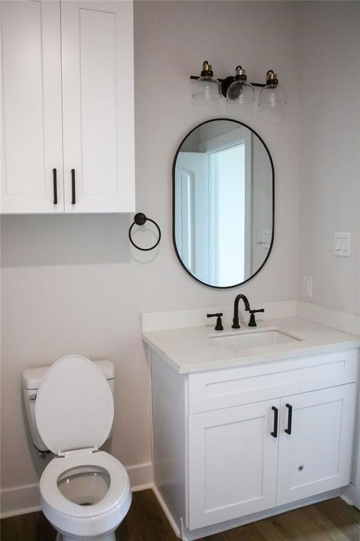 13214 Buccaneer Pkwy, Freeport, TX 77541 - bathroom with vanity and toilet