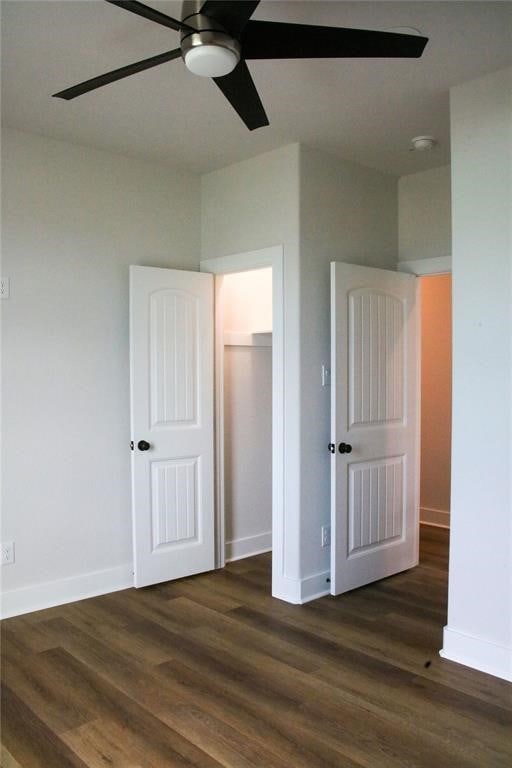 13214 Buccaneer Pkwy, Freeport, TX 77541 - unfurnished bedroom featuring wood finished floors, a closet, and ceiling fan
