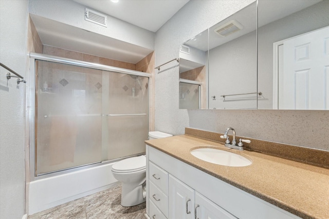 1880 White Oak Dr Unit 159, Houston, TX 77009 - bathroom featuring vanity and shower / bath combination with glass door