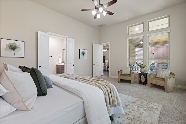 131 Evening Tide Ct, Conroe, TX 77318 - bedroom featuring light carpet, connected bathroom, and ceiling fan