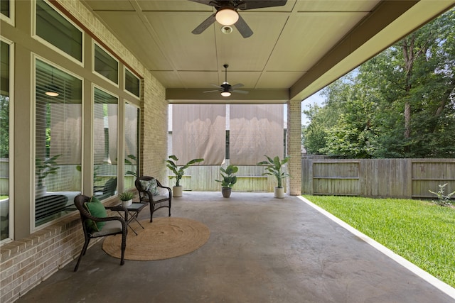 131 Evening Tide Ct, Conroe, TX 77318 - fenced backyard featuring a ceiling fan and a patio
