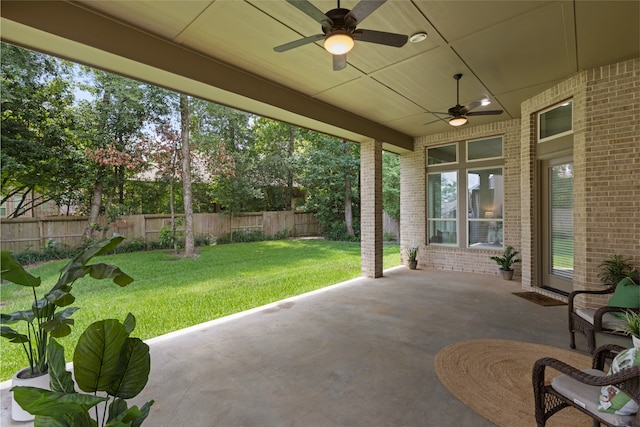 131 Evening Tide Ct, Conroe, TX 77318 - fenced backyard featuring ceiling fan and a patio
