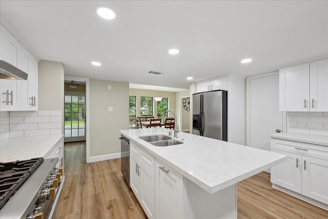 3533 Fm 563, Anahuac, TX 77514 - kitchen featuring stainless steel appliances, tasteful backsplash, light countertops, and recessed lighting