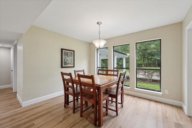 3533 Fm 563, Anahuac, TX 77514 - dining room featuring light wood-style flooring and baseboards