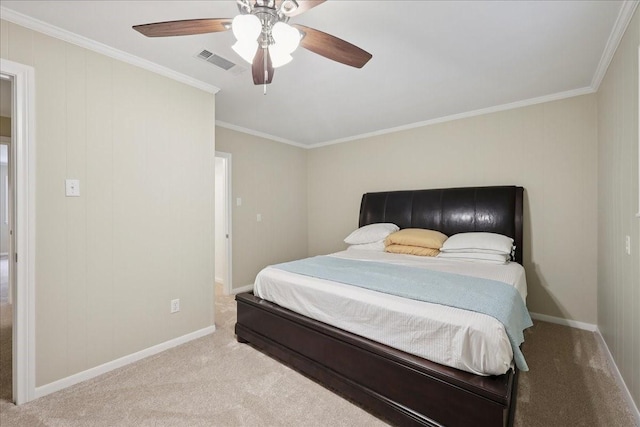 3533 Fm 563, Anahuac, TX 77514 - carpeted bedroom with ornamental molding and a ceiling fan