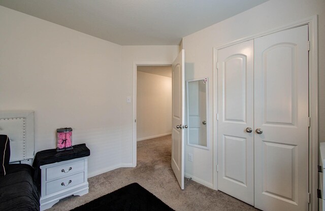 22418 Threefold Ridge Dr, Hockley, TX 77447 - bedroom featuring light colored carpet and baseboards