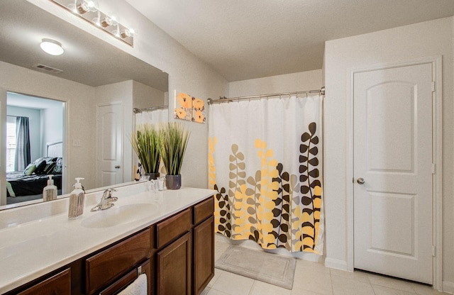 22418 Threefold Ridge Dr, Hockley, TX 77447 - bathroom featuring vanity, tile patterned floors, and a shower with curtain
