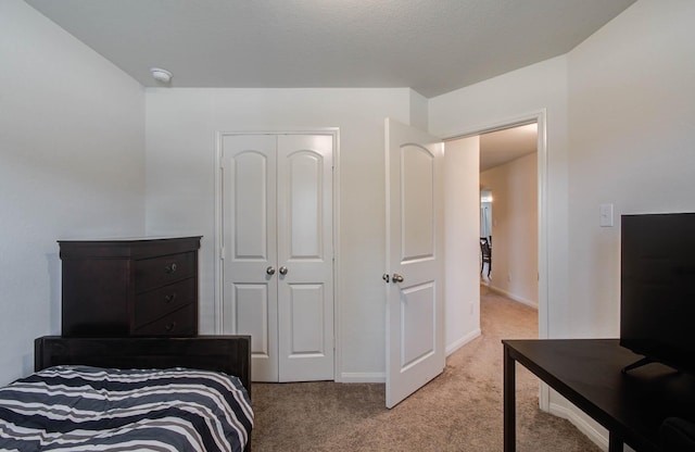 22418 Threefold Ridge Dr, Hockley, TX 77447 - bedroom featuring light colored carpet and a closet