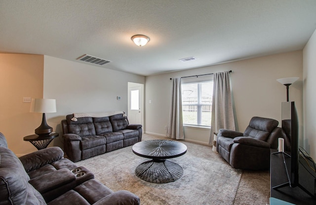 22418 Threefold Ridge Dr, Hockley, TX 77447 - carpeted living room featuring baseboards