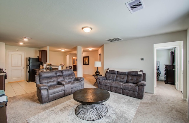 22418 Threefold Ridge Dr, Hockley, TX 77447 - living area with arched walkways and light carpet