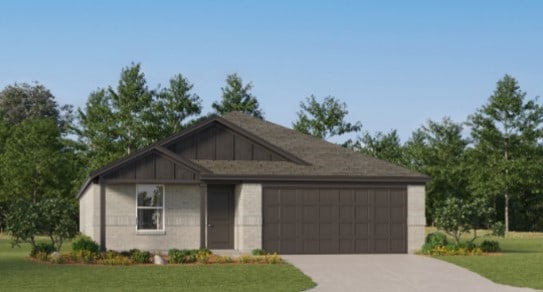 3013 Wild Dunes Dr, Katy, TX 77493 - single story home featuring an attached garage, a front yard, driveway, board and batten siding, and brick siding