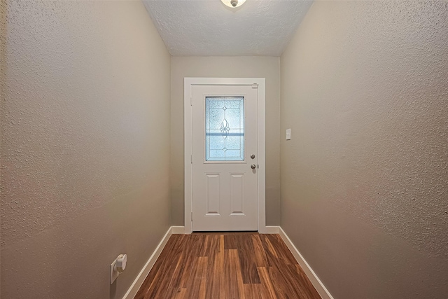 5130 Porter Ridge Dr, Houston, TX 77053 - entryway featuring dark wood-style floors and a textured wall