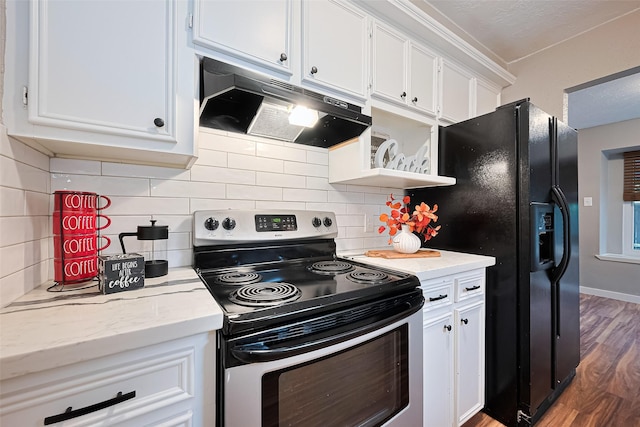 5130 Porter Ridge Dr, Houston, TX 77053 - kitchen with stainless steel electric range oven, under cabinet range hood, white cabinets, and wood finished floors