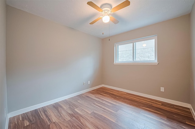 5130 Porter Ridge Dr, Houston, TX 77053 - spare room featuring wood finished floors and a ceiling fan