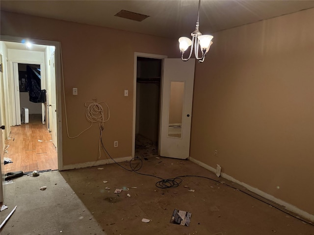 1151 Creekmont Dr, Houston, TX 77091 - unfurnished bedroom with a chandelier, a walk in closet, and a closet