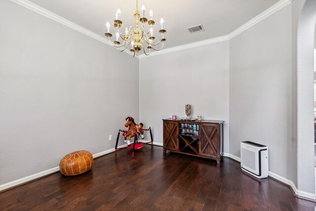 13518 Via Chianti Ln, Cypress, TX 77429 - empty room with crown molding, wood finished floors, arched walkways, and a chandelier