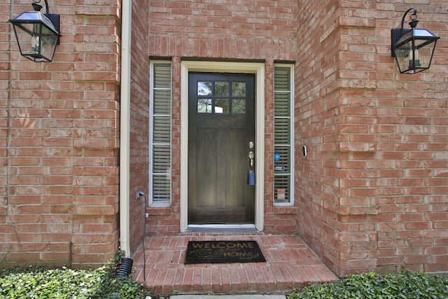 13518 Via Chianti Ln, Cypress, TX 77429 - view of exterior entry featuring brick siding