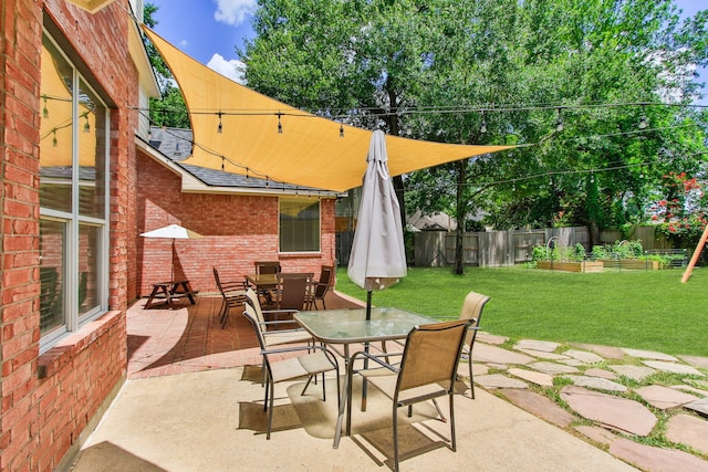 13518 Via Chianti Ln, Cypress, TX 77429 - fenced backyard with outdoor dining space and a patio area