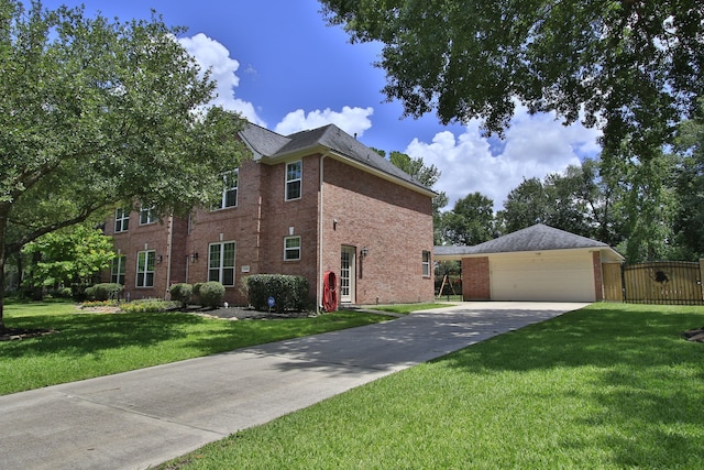 13518 Via Chianti Ln, Cypress, TX 77429 - view of home's exterior with brick siding and a detached garage