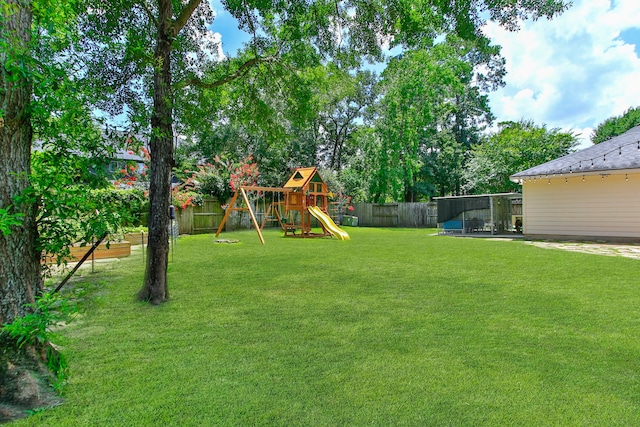 13518 Via Chianti Ln, Cypress, TX 77429 - fenced backyard featuring a playground