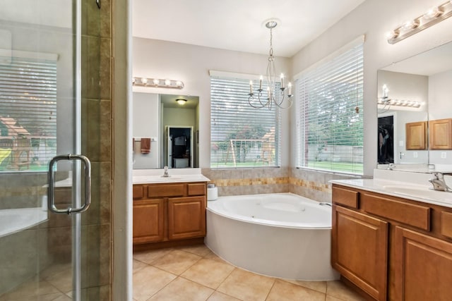 13518 Via Chianti Ln, Cypress, TX 77429 - bathroom featuring two vanities, a garden tub, healthy amount of natural light, and a shower stall