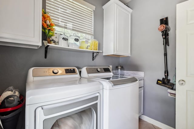 13518 Via Chianti Ln, Cypress, TX 77429 - washroom with cabinet space and independent washer and dryer