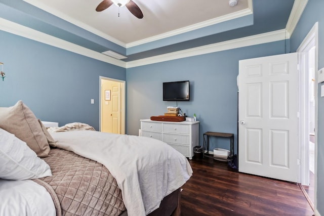 13518 Via Chianti Ln, Cypress, TX 77429 - bedroom with dark wood-style flooring, crown molding, and a ceiling fan