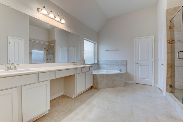 24014 Bluestem Ridge Ct, Katy, TX 77493 - full bath with a stall shower, double vanity, a bath, tile patterned floors, and lofted ceiling