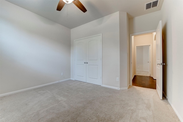 24014 Bluestem Ridge Ct, Katy, TX 77493 - unfurnished bedroom featuring carpet, a closet, and a ceiling fan