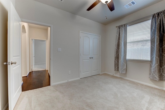 24014 Bluestem Ridge Ct, Katy, TX 77493 - unfurnished bedroom with carpet, a closet, and ceiling fan