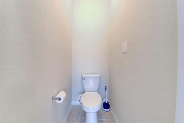 24014 Bluestem Ridge Ct, Katy, TX 77493 - bathroom featuring tile patterned flooring and a textured wall