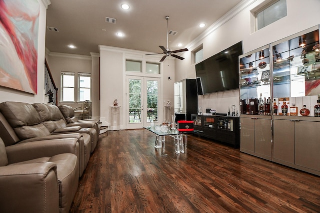 10924 Wrenwood Park, Houston, TX 77043 - living room with ornamental molding, dark wood-style floors, ceiling fan, recessed lighting, and bar area
