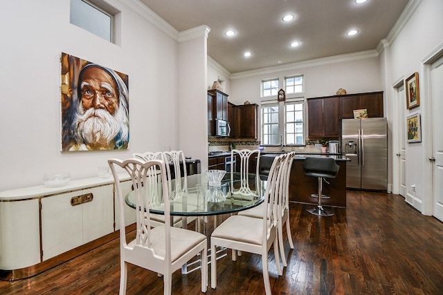 10924 Wrenwood Park, Houston, TX 77043 - dining area featuring ornamental molding, recessed lighting, and dark wood-style flooring