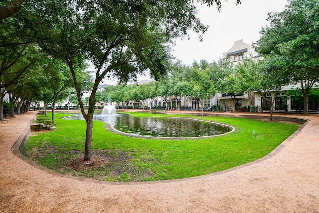 10924 Wrenwood Park, Houston, TX 77043 - view of community featuring a yard, a water view, and a residential view