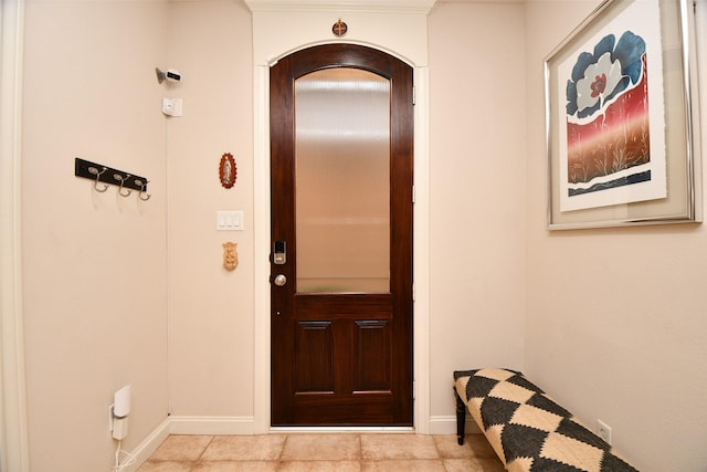 10924 Wrenwood Park, Houston, TX 77043 - foyer featuring arched walkways and tile patterned flooring